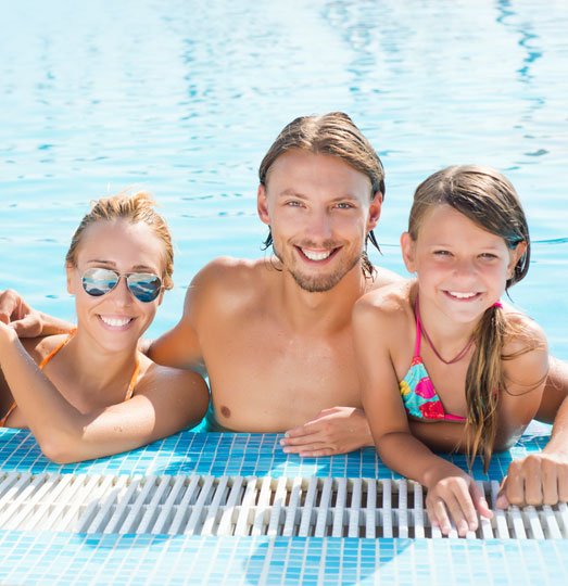 Happy Family at Swimming Pool